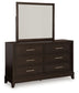 Neymorton King Upholstered Panel Bed with Mirrored Dresser, Chest and 2 Nightstands