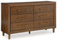 Lyncott California King Upholstered Bed with Dresser and Nightstand